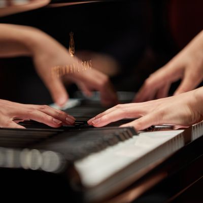 hands on piano keys